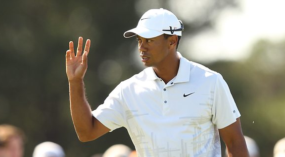 He's baaaack….Tiger Woods is leading the Australian Open after two rounds…